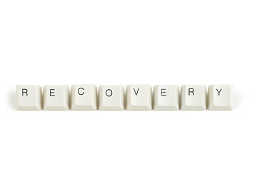 Image showing recovery from scattered keyboard keys on white