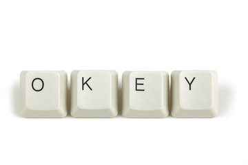 Image showing okey from scattered keyboard keys on white
