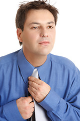Image showing Business man dressing for work
