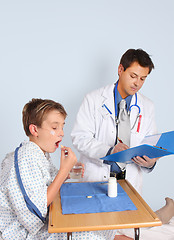 Image showing Doctor gives patient medication