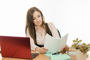 Image showing The teacher was surprised to check student notebook