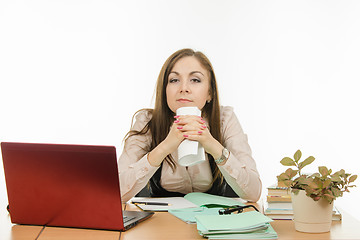 Image showing Tired teacher with a notebook in hands