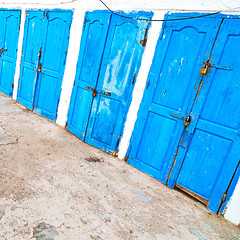 Image showing in africa morocco  old harbor wood   door and the blue sky