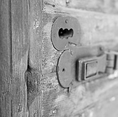 Image showing europe old in  italy  antique close brown door and rusty lock  c