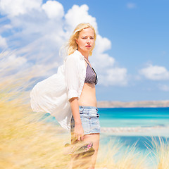 Image showing Free Happy Woman Enjoying Sun on Vacations.