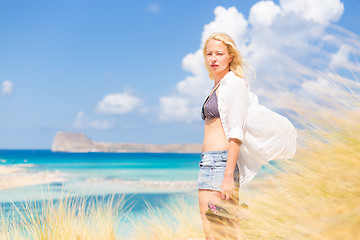 Image showing Free Happy Woman Enjoying Sun on Vacations.