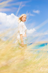 Image showing Free Happy Woman Enjoying Sun on Vacations.