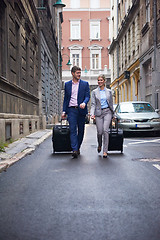 Image showing business people couple entering  hotel