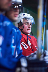 Image showing ice hockey players on bench