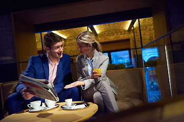 Image showing business couple take drink after work