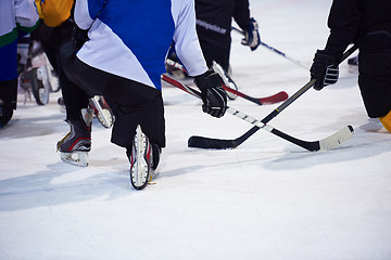 Image showing ice hockey players team meeting with trainer