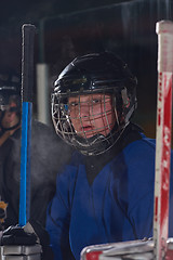 Image showing ice hockey players on bench