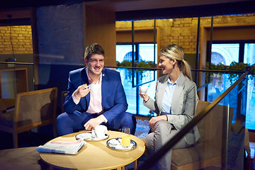 Image showing business couple take drink after work