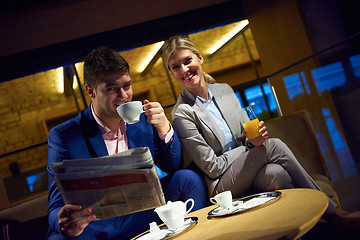Image showing business couple take drink after work