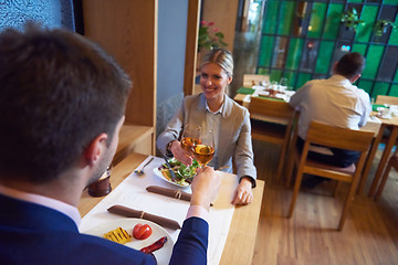 Image showing business couple having dinner