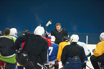 Image showing ice hockey players team meeting with trainer