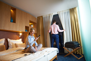 Image showing young couple in modern hotel room