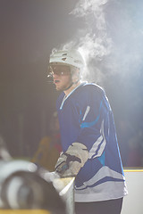 Image showing ice hockey players on bench