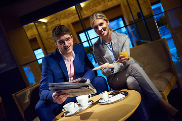 Image showing business couple take drink after work