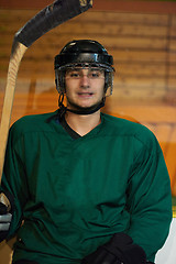 Image showing ice hockey players on bench