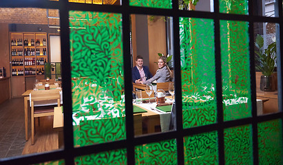 Image showing business couple having dinner