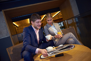 Image showing business couple take drink after work