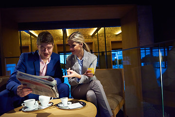 Image showing business couple take drink after work