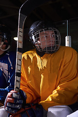 Image showing ice hockey players on bench