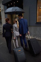 Image showing business people couple entering  hotel