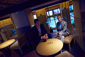 Image showing business couple take drink after work