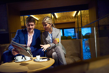 Image showing business couple take drink after work