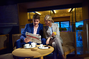 Image showing business couple take drink after work