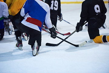 Image showing ice hockey players team meeting with trainer