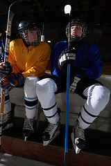 Image showing ice hockey players on bench