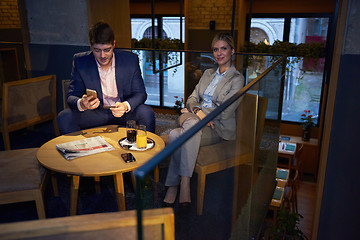 Image showing business couple take drink after work