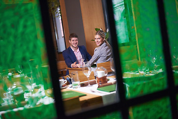 Image showing business couple having dinner