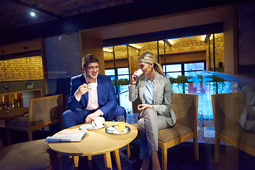 Image showing business couple take drink after work