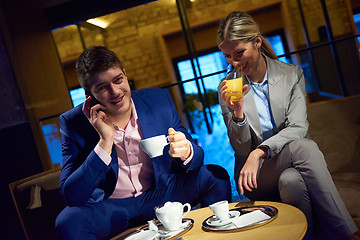 Image showing business couple take drink after work