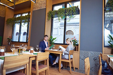 Image showing business couple having dinner