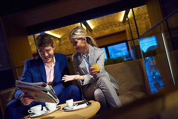 Image showing business couple take drink after work