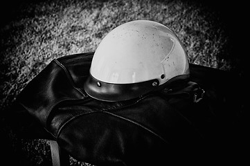 Image showing black leather jacket white motorcycle helmet