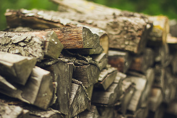 Image showing A stack of firewood close up 