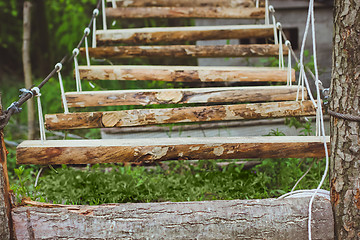Image showing Wooden stairs in the green forest park