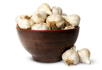 Image showing Whole head of garlic in ceramic bowl