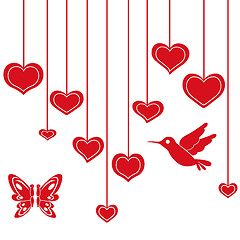 Image showing Red hearts hanging on a string
