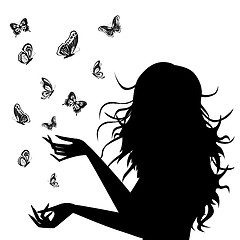 Image showing Woman silhouette with butterflies around her