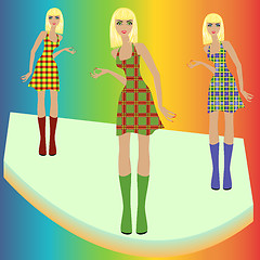 Image showing Fashion blond models posing on podium in checkered dresses