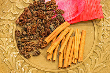 Image showing Cinnamon and cones