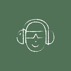 Image showing Man in a headphones icon drawn chalk.