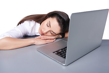 Image showing Businesswoman asleep on her laptop